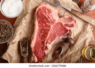 Raw Tbone Steak For Blessing Day And Christmas Holidays. A Piece Of Fresh Organic Farm Meat