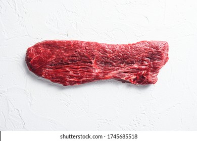 Raw Tri Tip, Bottom Sirloin Steak On A White Stone Background Top View