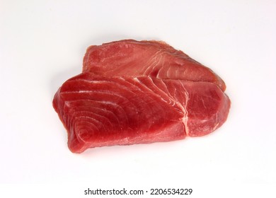 Raw Tuna Steak Slice On A White Background. Fish Steak