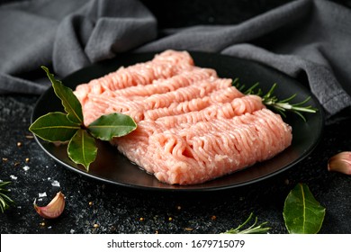 Raw Turkey Breast Fillets Minced Meat On Black Plate Ready To Cook