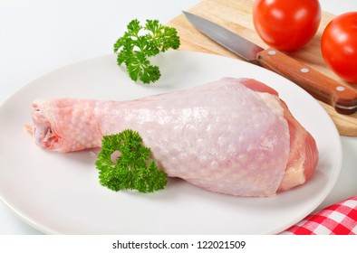 Raw Turkey Legs With Tomatoes 