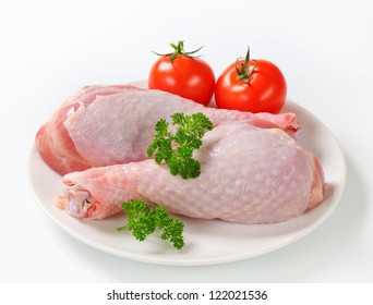 Raw Turkey Legs With Tomatoes 