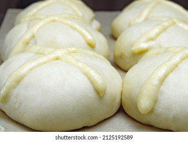 Raw Unbaked Scones. Ready To Bake Homemade Traditional Easter Buns With Hot Cross. Easter Holiday Baked Goods. Close-up.