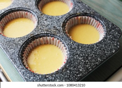 Raw Uncooked  Corn Muffins In A Muffin Mold. 