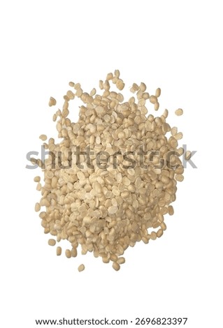 Raw urad dal (split black gram) isolated on a white background. Traditional South Asian pulse rich in protein and fiber, used in Pakistani and Indian cooking. Ideal for use in food advertising.