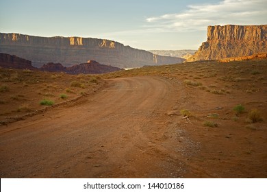 Raw Utah Desert Landscape - Sandy Backcountry Road Near Moab, Utah, USA.