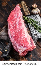 Raw Veal Brisket Meat On Short Spare Rib With Butcher Knife. Dark Wooden Background. Top View