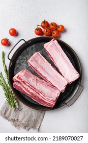 Raw Veal Calf Short Rib Meat, On Gray Concrete Table Background, Top View Flat Lay.