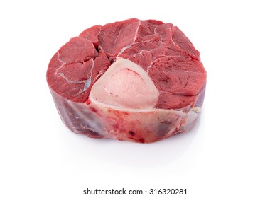 Raw veal shank for making OssoBuco Raw fresh cross cut veal shank and seasonings for making Osso Buco