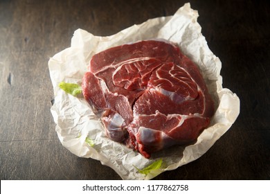 Raw Veal Shank On Desk