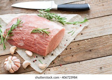 Raw Veal Tenderloin On Rustic Wooden Table Ready To Cook