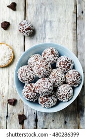 raw vegan almond butter coconut chocolate balls. toning. selective focus