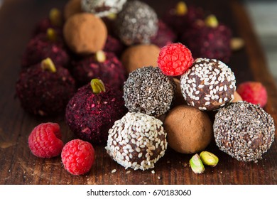 Raw Vegan Sweet Candy Gluten-free Rolls With Carob, Hibiscus, Chia Seeds And Nuts