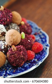 Raw Vegan Sweet Candy Gluten-free Rolls With Carob, Hibiscus, Chia Seeds And Nuts