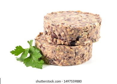 Raw Veggie Burger With Black Beans With Parsley Leaves On White Background.