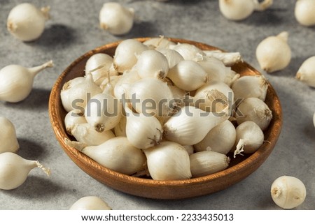 Raw White Organic Pearl Onions in a Bunch