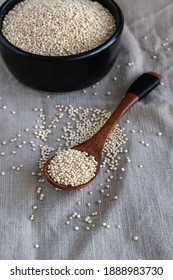 Raw White Quinoa In Black Bowl