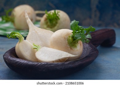 Raw white turnips on wooden plate. Tasty fresh white  japanese radish. Healthy, vegetarian food. - Powered by Shutterstock