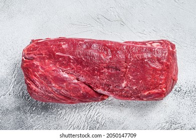 Raw Whole Tenderloin Beef Meat. White Background. Top View