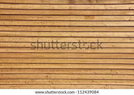 Raw wood, wooden slatted fence or wall