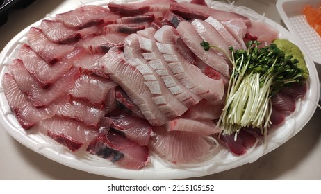 Raw Yellowtail Fish, Radish Sprouts , Wasabi.