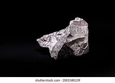 Raw Zinc Nugget On Isolated Black Background, Metal Used In Alloy And Steel Production