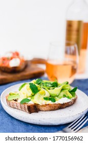 Raw Zucchini And Goat Cheese Crostini With Mint Leaves