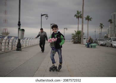 rawche, beirut lebanon - December ‎28 2020 : A Syrian refugee child selling roses in Beirut