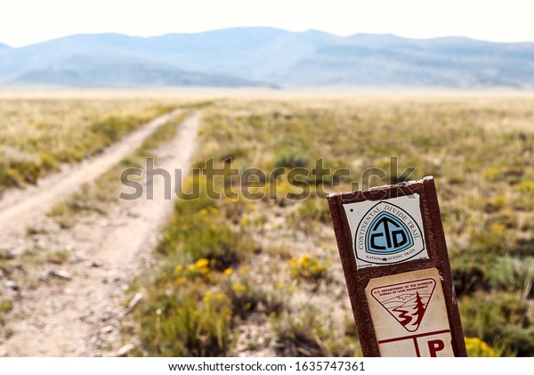 Rawlins, Wyoming - 2015: Continental Divide Trail\
sign. The Continental Divide National Scenic Trail (Continental\
Divide Trail - CDT) is a United States National Scenic Trail from\
Mexico to Canada.