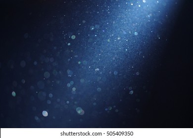 ray of light blue background with bekeh lights