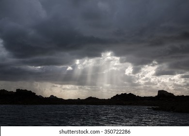 Ray Of Sunshine Breaking Through The Dark Clouds After A Storm. Brehat, Brittany, France