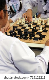 Rayong, Thailand - 8th September, 2017: Thai High School Girls Play A Game Of Chess In Class As Part Of A Club Activity, Rayong Province, Eastern Thailand.