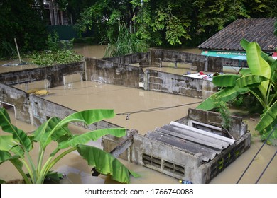 Rayong thailand, June 30 2020, Water flood on river after rain in rayong thailand, flooding house with rising water, flooding in rayong thailand