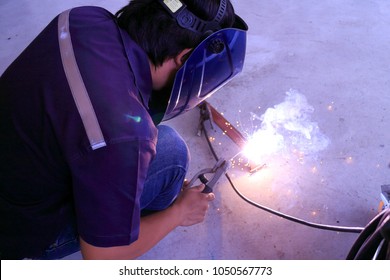 Rayong Thailand , Mar.20 - 2018 : worker steel welding in factory work shop. - Shutterstock ID 1050567773