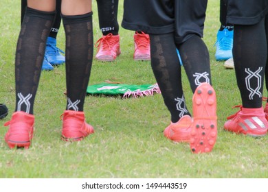 Rayong ,Thailand - SEPTEMBER 1, 2019 : Football Match Ptt. Rayong Youth League 2019 ,Player  Age Not Over 10 Years Old By Benjarong Fc. Pep Talk With Coach Before Start Game In Thailand.