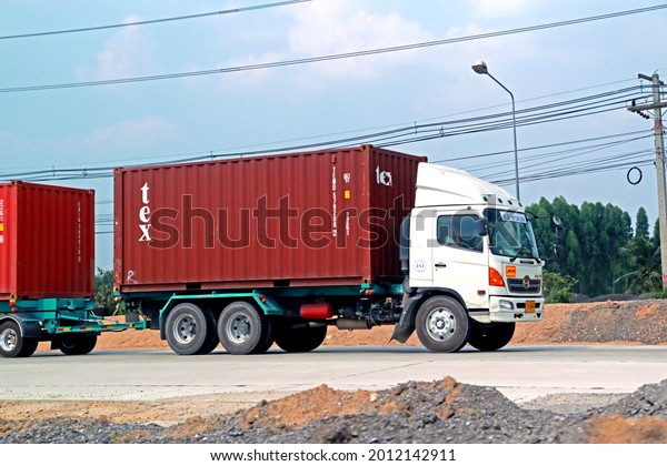 RAYONG-THAILAND-MARCH 1 : The transportation\
truck on the road in local town of Thailand, March 1,2017, Rayong\
Province,\
Thailand.
