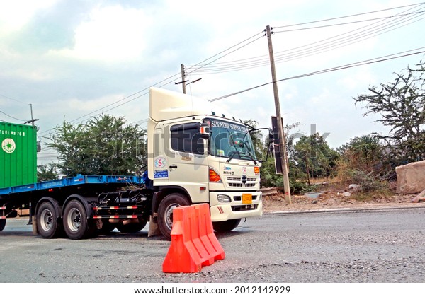 RAYONG-THAILAND-MARCH 1 : The transportation\
truck on the road in local town of Thailand, March 1,2017, Rayong\
Province,\
Thailand.