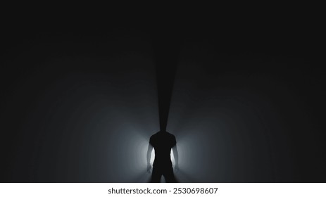 Rays of bright backlight pass through the human figure. Spiritual and religious themes