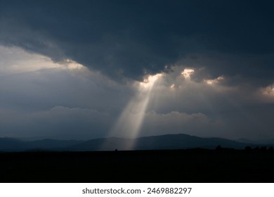 Rays of light from between the clouds
