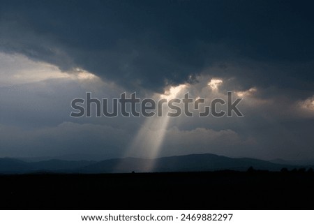 Rays of light from between the clouds
