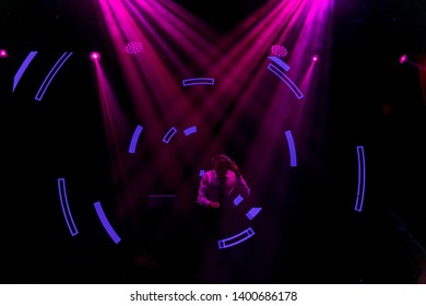 in the rays of light playing in a disco