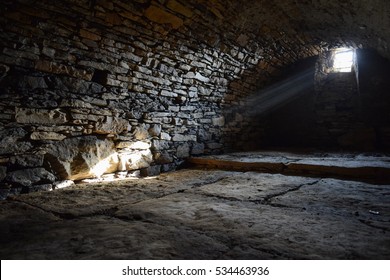 Rays of light shining into the old cellar