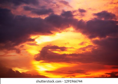 Rays Of Light Shining Through Dark Clouds For Background 