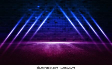 Rays Neon Light On Neon Brick Wall With Wet Asphalt. Empty Scene. Copy Space