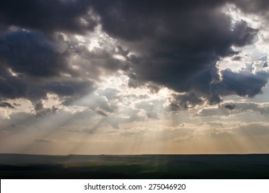 rays of the sun breaking through the clouds