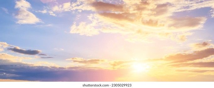 The rays of the sun breaking through the dramatic clouds in the evening or in the morning in the sunset or dawn sky. The concept of faith, hope for the best or good weather.