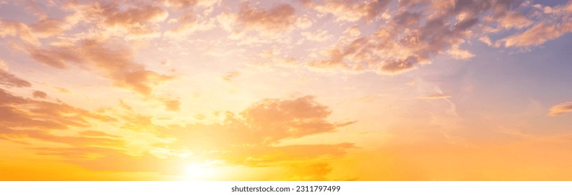 The rays of the sun breaking through the dramatic clouds in the evening or in the morning in the sunset or dawn sky. The concept of faith, hope for the best or good weather.