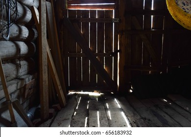 The rays of the sun through the cracks of the door.