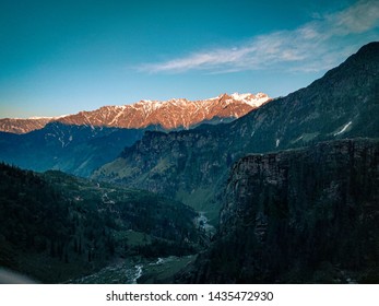 Rays of Sun touching the Mountains