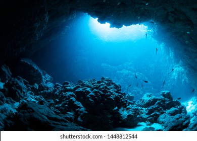 Rays of sunlight into the underwater cave - Powered by Shutterstock